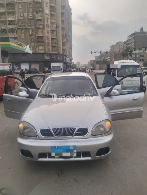 دايو لانوس 2003 فضي مستعملة للبيع - 1