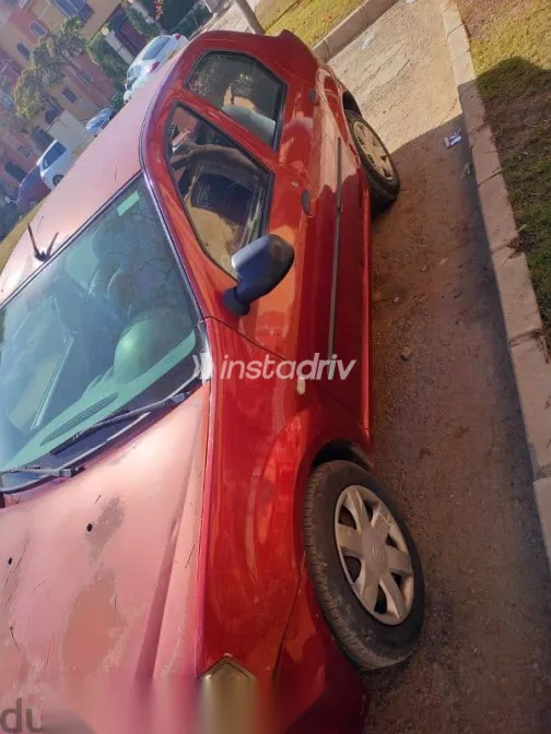 رينو لوجان 2011 أحمر مستعملة للبيع - 9