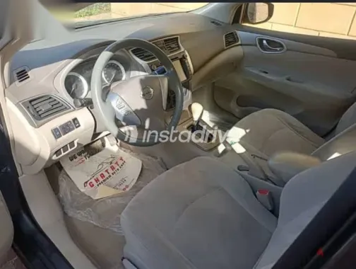 نيسان سنترا 2015 فضي مستعملة للبيع - 5