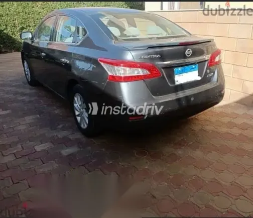 نيسان سنترا 2015 فضي مستعملة للبيع - 6