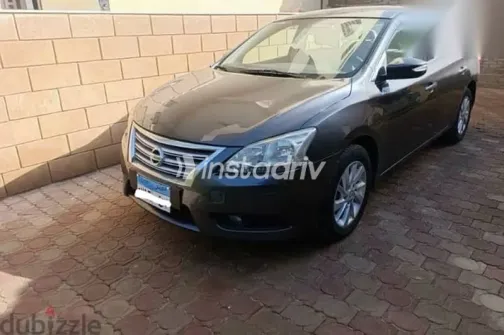 نيسان سنترا 2015 فضي مستعملة للبيع - 8