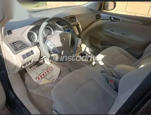 نيسان سنترا 2015 فضي مستعملة للبيع - 9