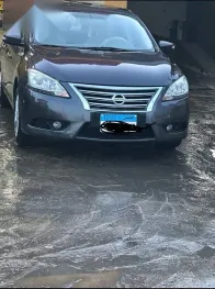 نيسان سنترا 2015 فضي مستعملة للبيع