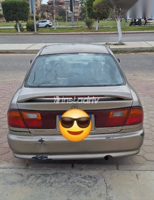 Mazda 323 1998 Gold Used for Sale - 3