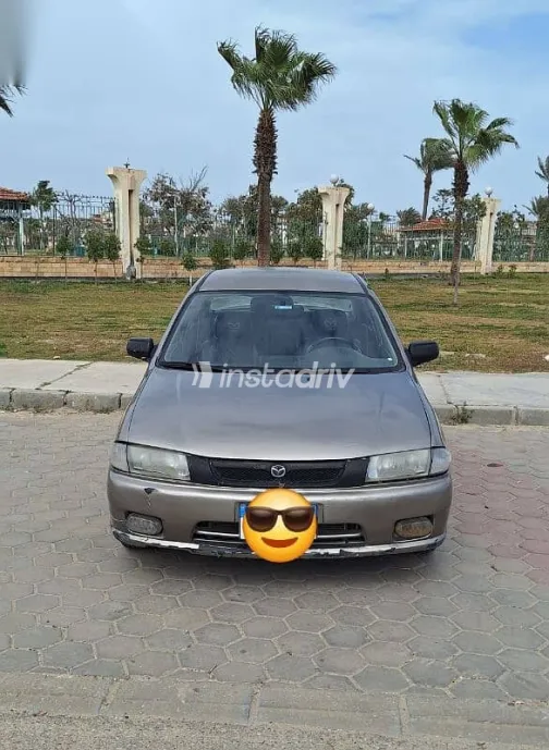 Mazda 323 1998 Gold Used for Sale - 4