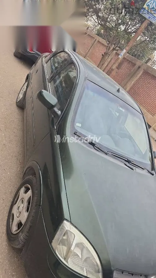 اوبل كورسا 2005 أخضر مستعملة للبيع - 1