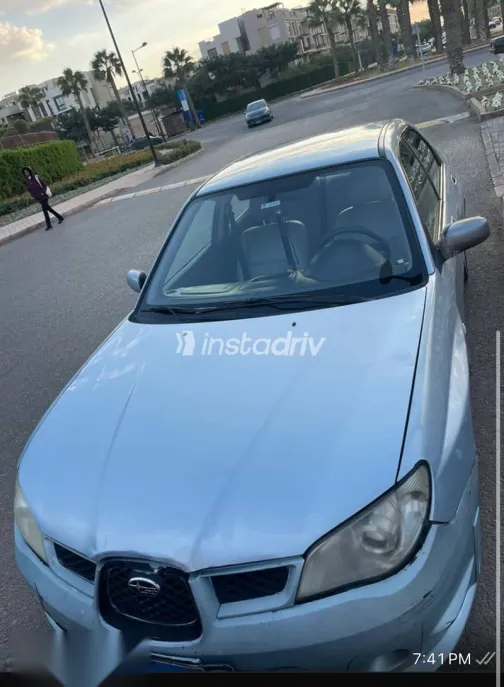 سوبارو امبريزا 2007 أبيض مستعملة للبيع - 3