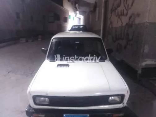 فيات 128 1989 أبيض مستعملة للبيع - 1