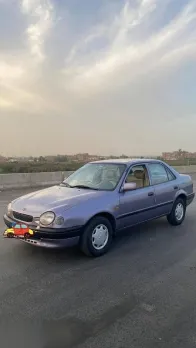 تويوتا كورولا 1998 أبيض مستعملة للبيع