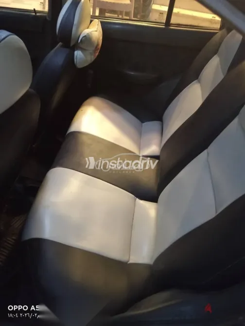 هيونداي اكسنت 1999 فضي مستعملة للبيع - 1