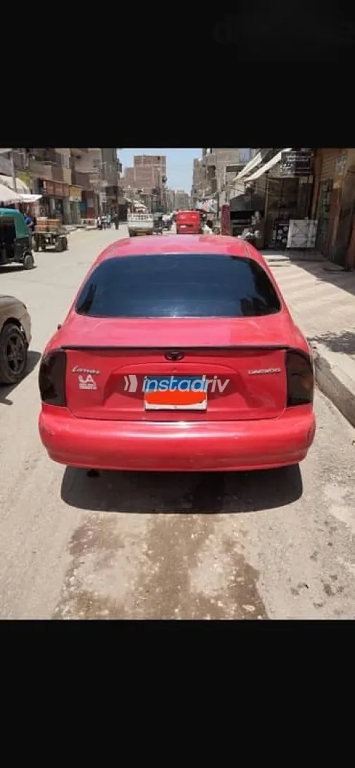 دايو لانوس 2002 أحمر مستعملة للبيع - 2