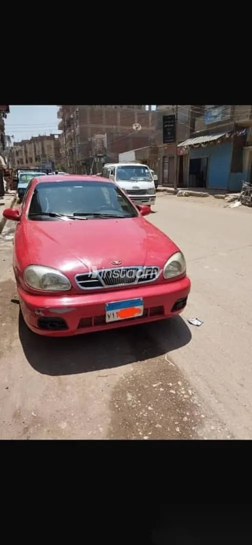 دايو لانوس 2002 أحمر مستعملة للبيع - 6