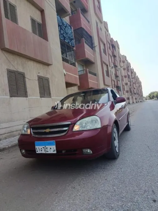 شيفروليه أوبترا 2010 أحمر مستعملة للبيع - 3