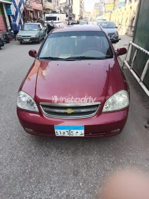 شيفروليه أوبترا 2010 أحمر مستعملة للبيع - 4