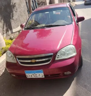 شيفروليه أوبترا 2010 أحمر مستعملة للبيع