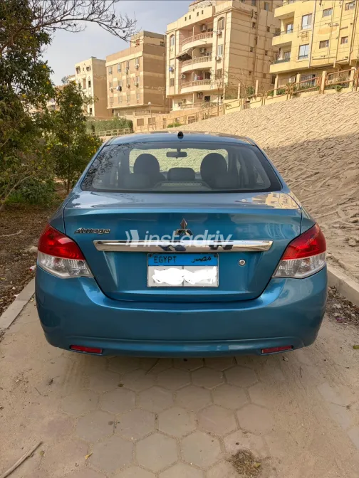 ميتسوبيشي اتراج 2015 أبيض مستعملة للبيع - 7