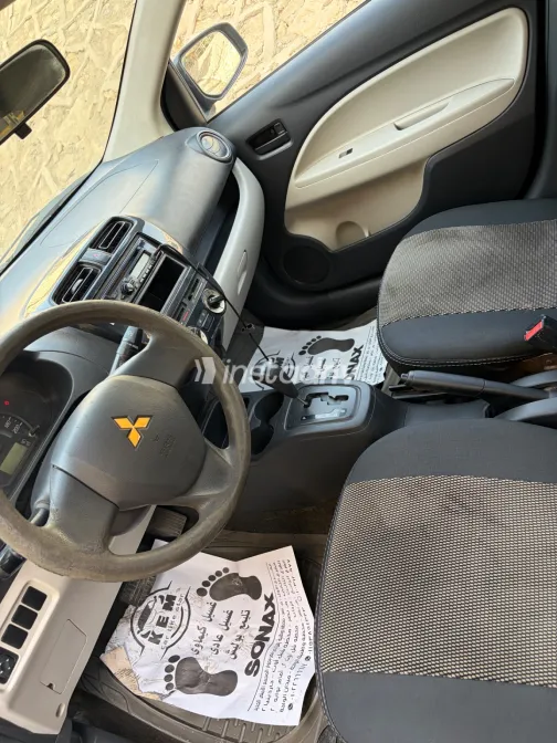 ميتسوبيشي اتراج 2015 أبيض مستعملة للبيع - 10