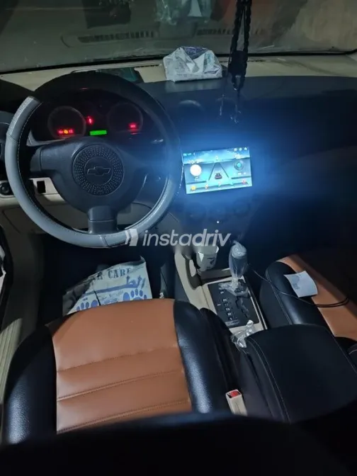 شيفروليه افيو 2013 فضي مستعملة للبيع - 4