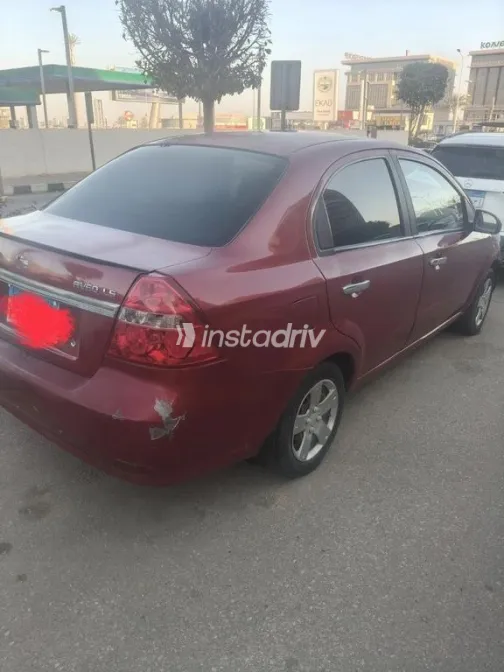 شيفروليه افيو 2014 أحمر مستعملة للبيع - 1