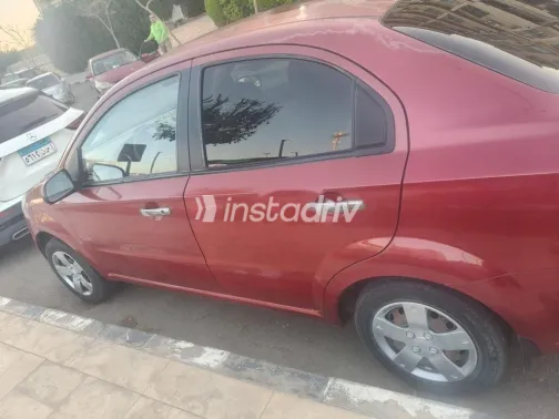 شيفروليه افيو 2014 أحمر مستعملة للبيع - 2