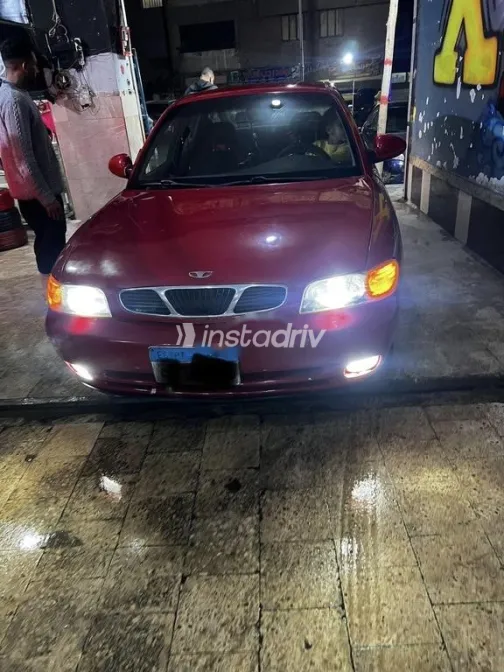 دايو نوبيرا 1999 أحمر مستعملة للبيع - 1