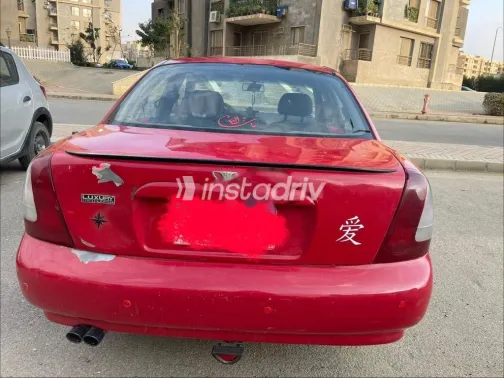 دايو نوبيرا 1999 أحمر مستعملة للبيع - 4