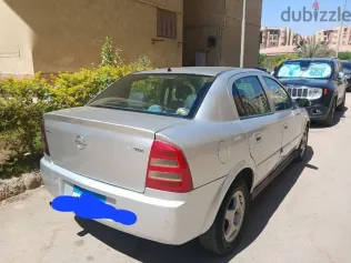 اوبل أسترا 2005 فضي مستعملة للبيع