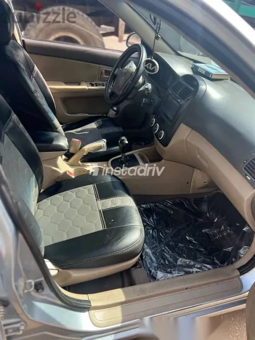 كيا سيراتو 2008 أزرق غامق مستعملة للبيع - 4