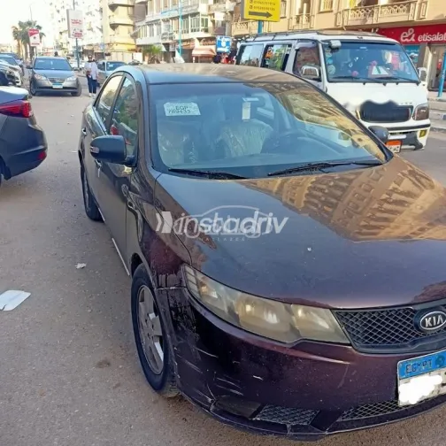 كيا سيراتو 2011 باذنجاني مستعملة للبيع - 2