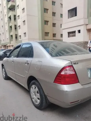 تويوتا كورولا 2005 أبيض مستعملة للبيع