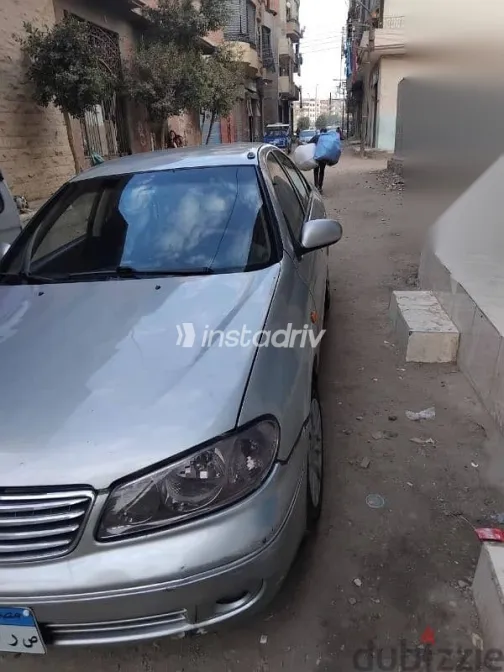 نيسان صنى 2007 فضي مستعملة للبيع - 2