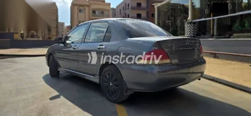 ميتسوبيشي لانسر 2010 فضي مستعملة للبيع - 3