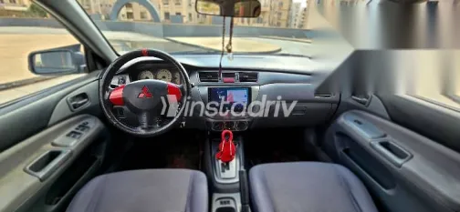 ميتسوبيشي لانسر 2010 فضي مستعملة للبيع - 7