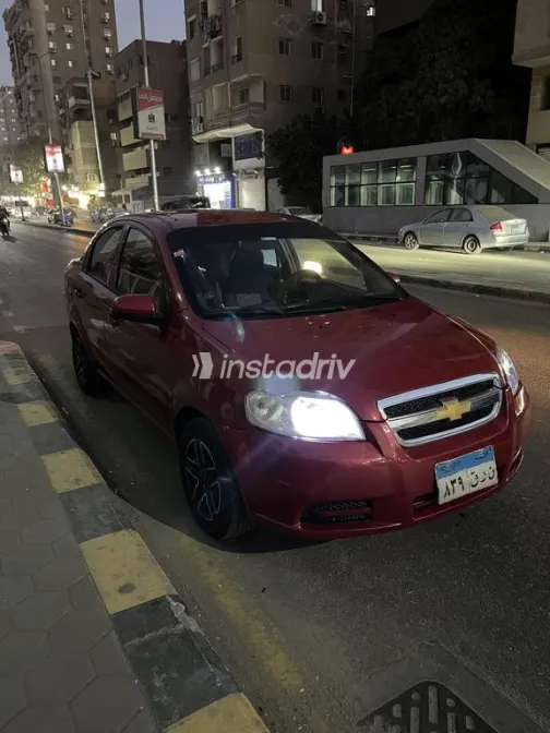 شيفروليه افيو 2009 أحمر مستعملة للبيع - 1