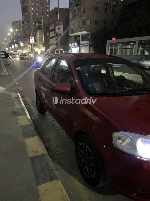 شيفروليه افيو 2009 أحمر مستعملة للبيع - 2