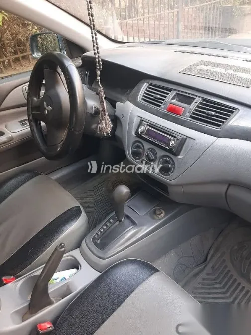 ميتسوبيشي لانسر 2007 أزرق غامق مستعملة للبيع - 5