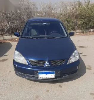 ميتسوبيشي لانسر 2007 أزرق غامق مستعملة للبيع