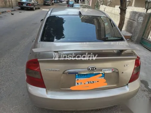 كيا سيراتو 2006 ذهبي مستعملة للبيع - 1