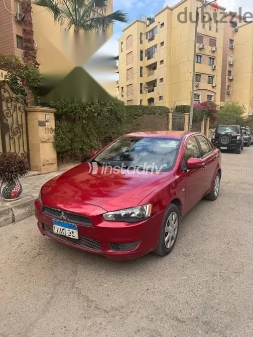 ميتسوبيشي لانسر 2016 أحمر مستعملة للبيع - 2