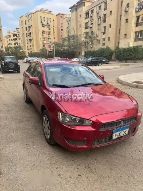 ميتسوبيشي لانسر 2016 أحمر مستعملة للبيع - 3