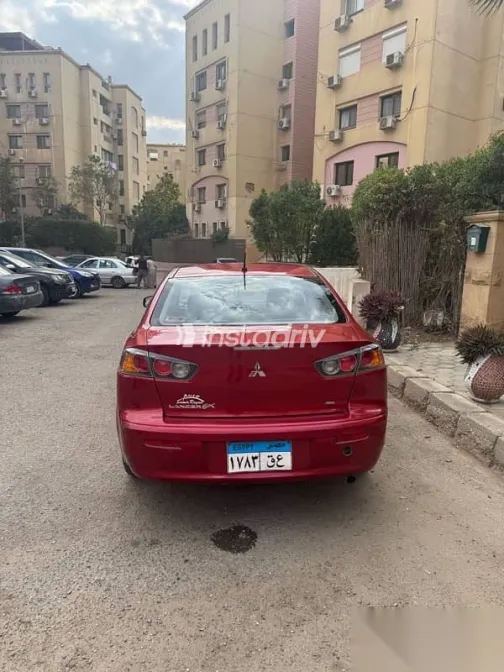 ميتسوبيشي لانسر 2016 أحمر مستعملة للبيع - 4