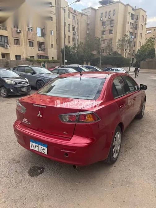 ميتسوبيشي لانسر 2016 أحمر مستعملة للبيع - 5