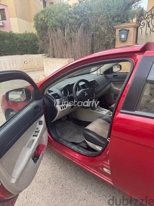 ميتسوبيشي لانسر 2016 أحمر مستعملة للبيع - 6