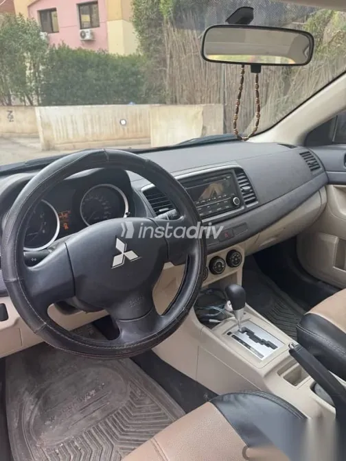 ميتسوبيشي لانسر 2016 أحمر مستعملة للبيع - 7