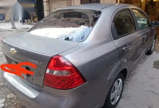 شيفروليه افيو 2013 فضي مستعملة للبيع