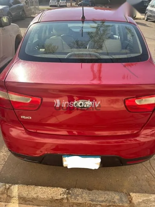 كيا ريو 2013 أحمر مستعملة للبيع - 1