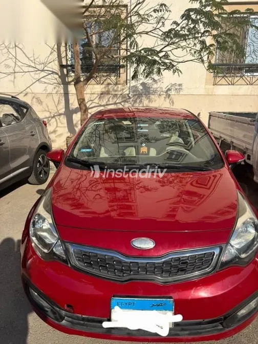 كيا ريو 2013 أحمر مستعملة للبيع - 2