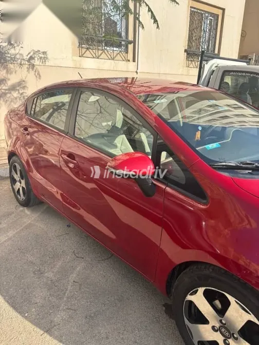 كيا ريو 2013 أحمر مستعملة للبيع - 6