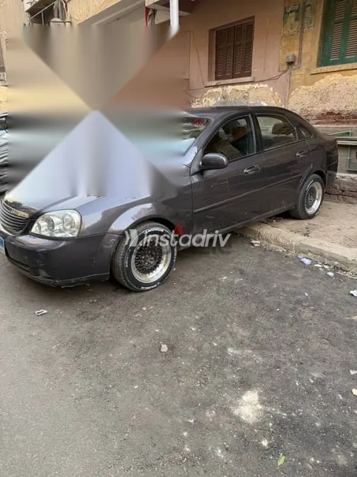 شيفروليه أوبترا 2011 رمادي مستعملة للبيع - 1