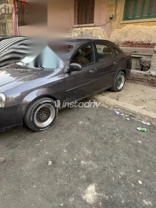 شيفروليه أوبترا 2011 رمادي مستعملة للبيع - 2